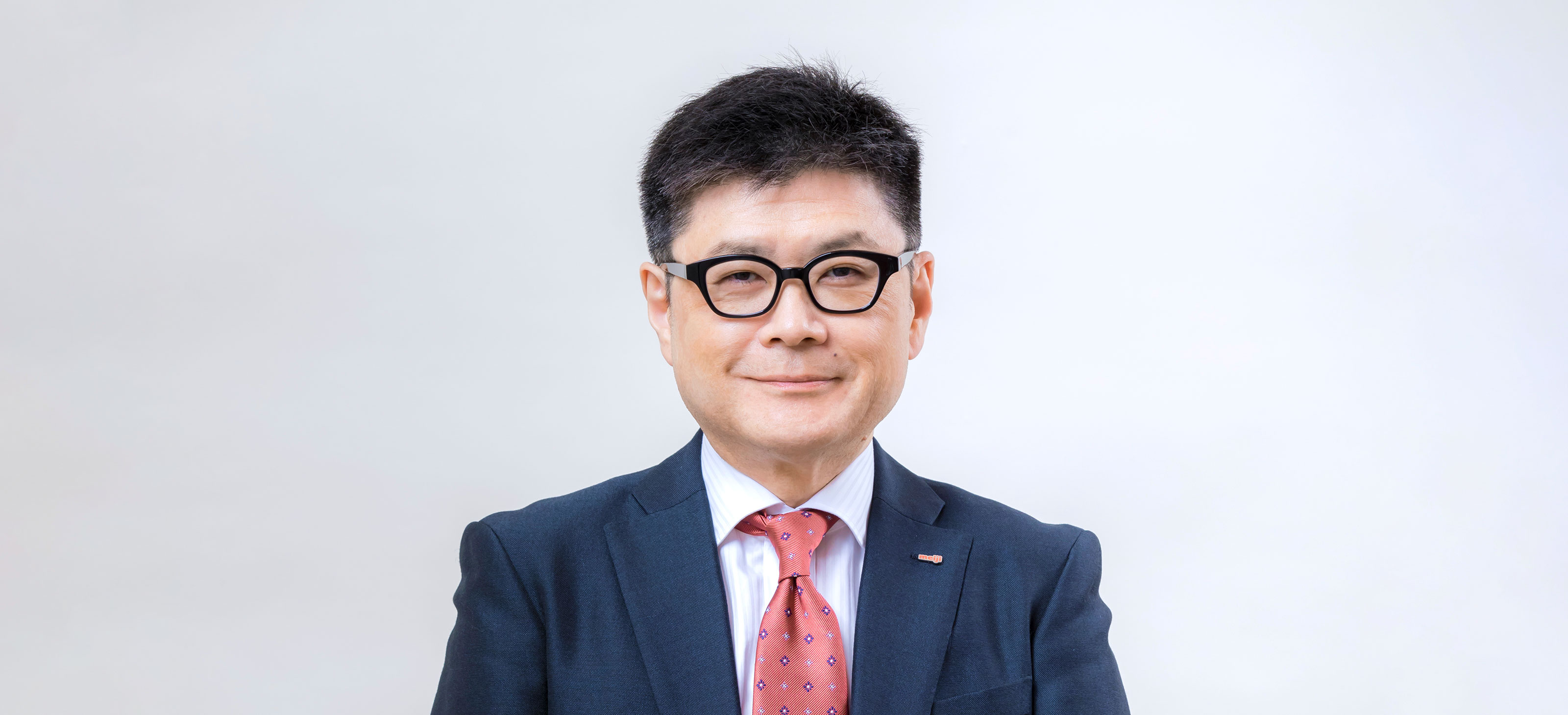 写真:明治ホールディングス株式会社 取締役常務執行役員 CFO 菱沼 純